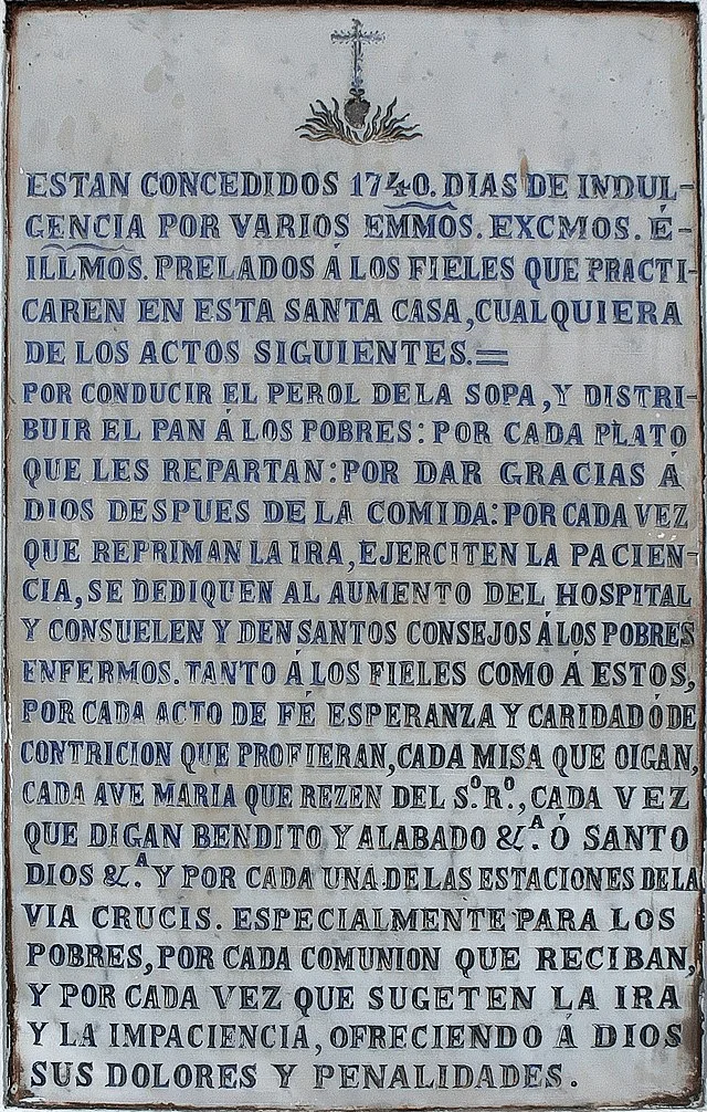 Anuncio del Hospital de la Caridad de Sevilla en el que se anuncian 1.740 días de indulgencias. La presencia de este tipo de textos en numerosos edificios religiosos demuestra la importancia de la creencia en las ánimas del Purgatorio en diversos contextos. Fuente.